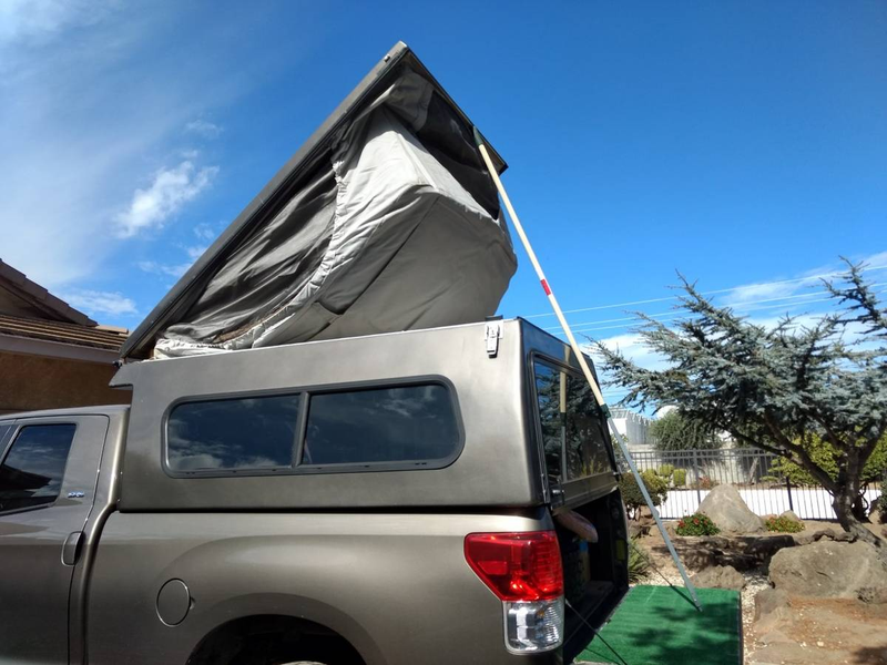 Illustration for article titled At $26,000, Is This 2010 Toyota Tundra Camper Totally Over The Top?